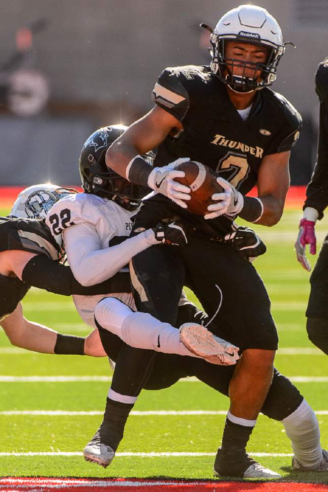 Trent Nelson  |  The Salt Lake Tribune
Desert Hills' Nephi Sewell is stopped by Pine View's D'angelo Mpungi as Desert Hills faces Pine View in the Class 3AA high school football state championship at Rice-Eccles Stadium in Salt Lake City, Friday November 18, 2016.
