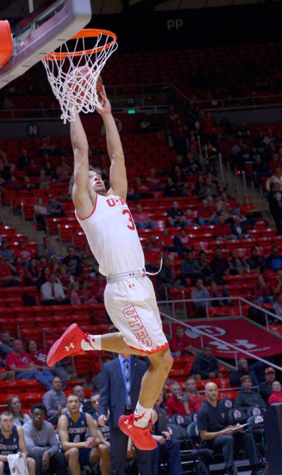 Leah Hogsten  |  The Salt Lake Tribune
Utah Utes guard Devon Daniels (3) stuffs the net backwards. University of Utah men's basketball team defeated Concordia 96-53 at the Jon M. Huntsman Center, November 15, 2016.