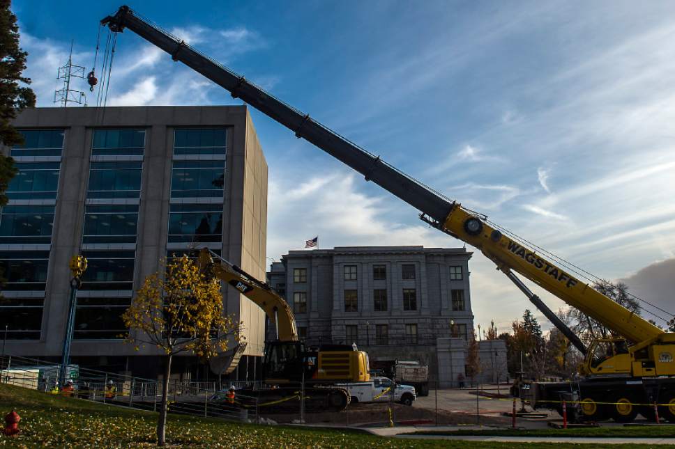 Chris Detrick  |  The Salt Lake Tribune
Construction crews replace an aging underground tank at the Utah State Capitol Wednesday November 16, 2016.