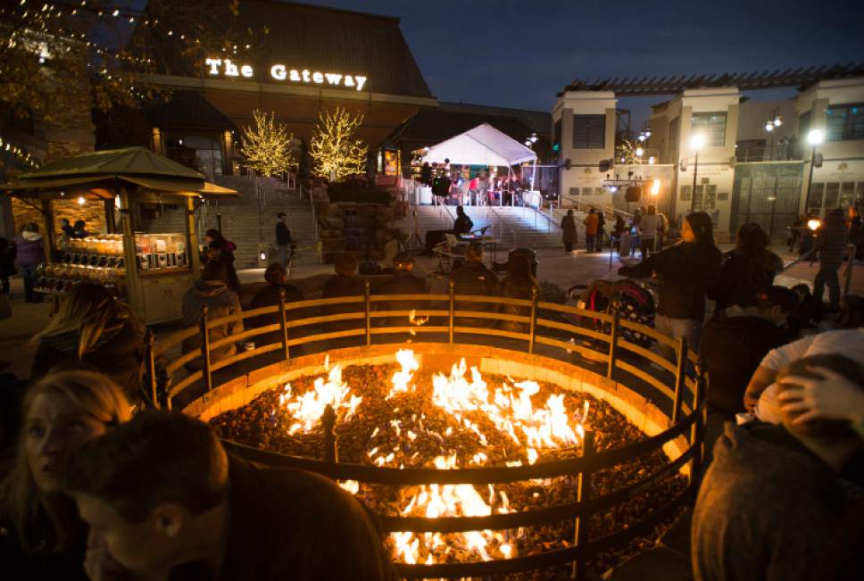 Rick Egan  |  The Salt Lake Tribune

Party goers listen to the band "Chaning Lanes" at the 16th annual "Light Up The Night" Christmas tree lighting party, Saturday, November 19, 2016.