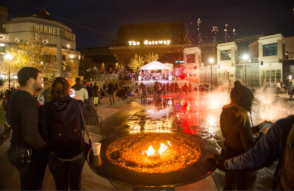 Rick Egan  |  The Salt Lake Tribune

Party goers listen to the band "Changing Lanes" at the 16th annual "Light Up The Night" Christmas tree lighting party, Saturday, November 19, 2016.