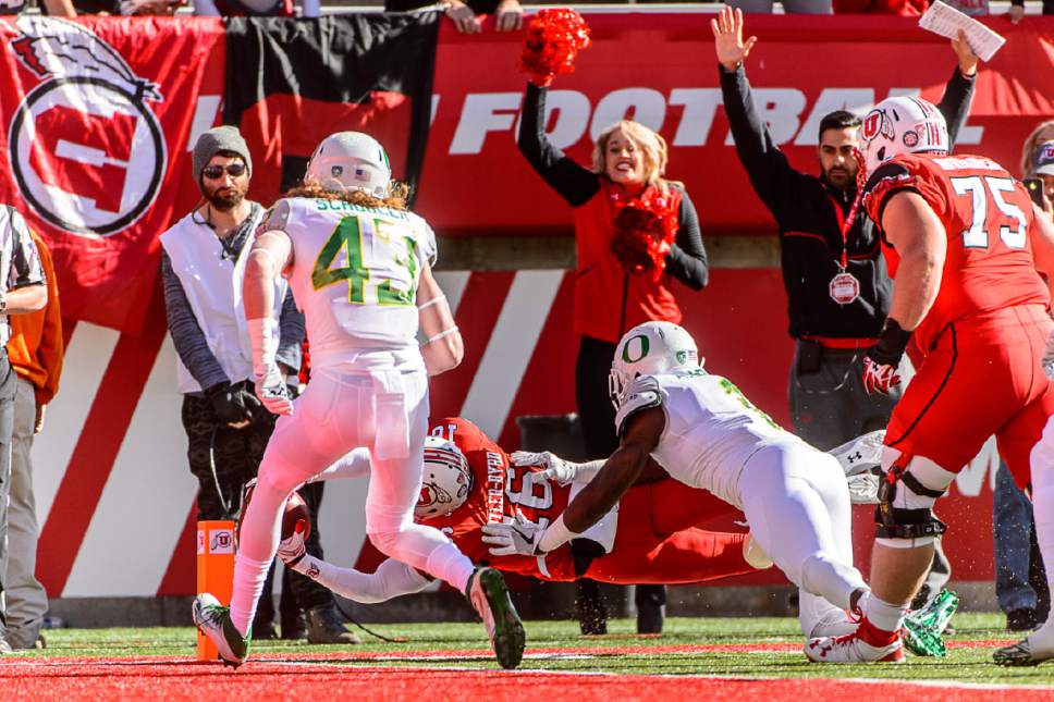Trent Nelson  |  The Salt Lake Tribune
Utah Utes wide receiver Cory Butler-Byrd (16) dives for a touchdown as Utah hosts Oregon, NCAA football at Rice-Eccles Stadium in Salt Lake City, Saturday November 19, 2016.