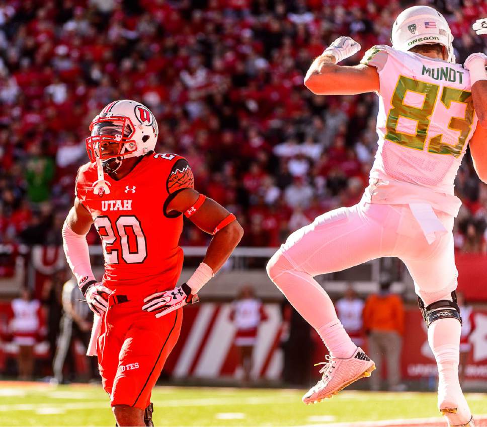 Trent Nelson  |  The Salt Lake Tribune
Utah Utes defensive back Marcus Williams (20) and Oregon Ducks tight end Johnny Mundt (83) react to an Oregon touchdown in the third quarter, as Utah hosts Oregon, NCAA football at Rice-Eccles Stadium in Salt Lake City, Saturday November 19, 2016.