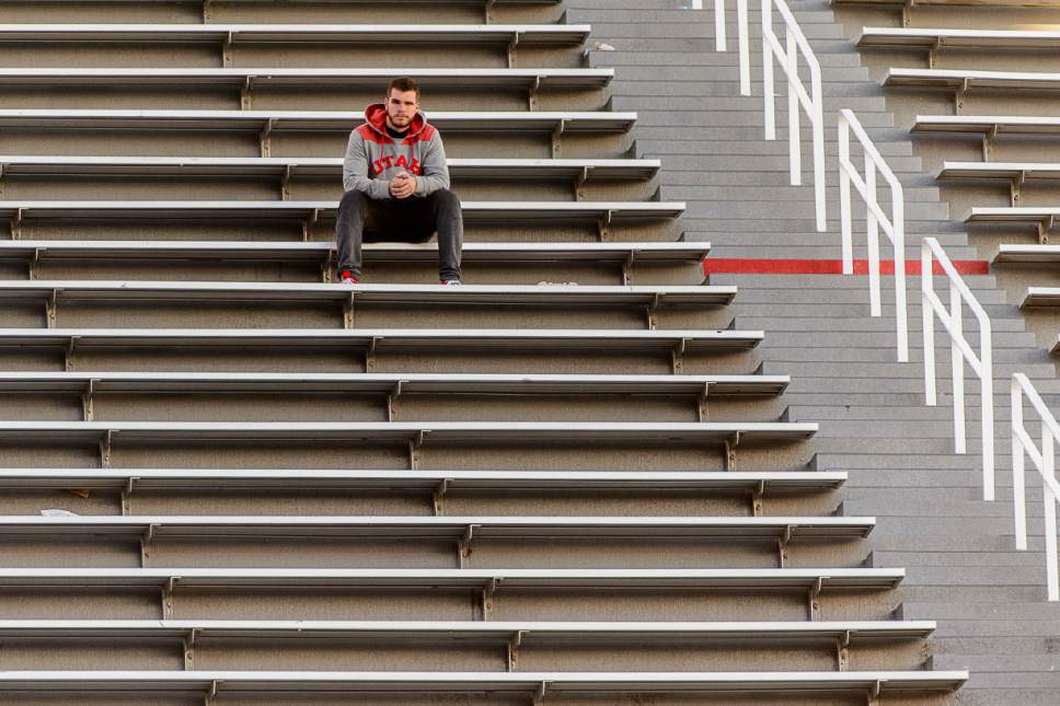 Trent Nelson  |  The Salt Lake Tribune
A Utah fan sites alone after the loss to Oregon, NCAA football at Rice-Eccles Stadium in Salt Lake City, Saturday November 19, 2016.