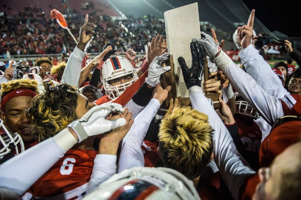 Chris Detrick  |  The Salt Lake Tribune
Members of the East football team celebrate after winning the 4A football championship at Rice-Eccles Stadium Friday November 18, 2016. East defeated Springville 48-20.