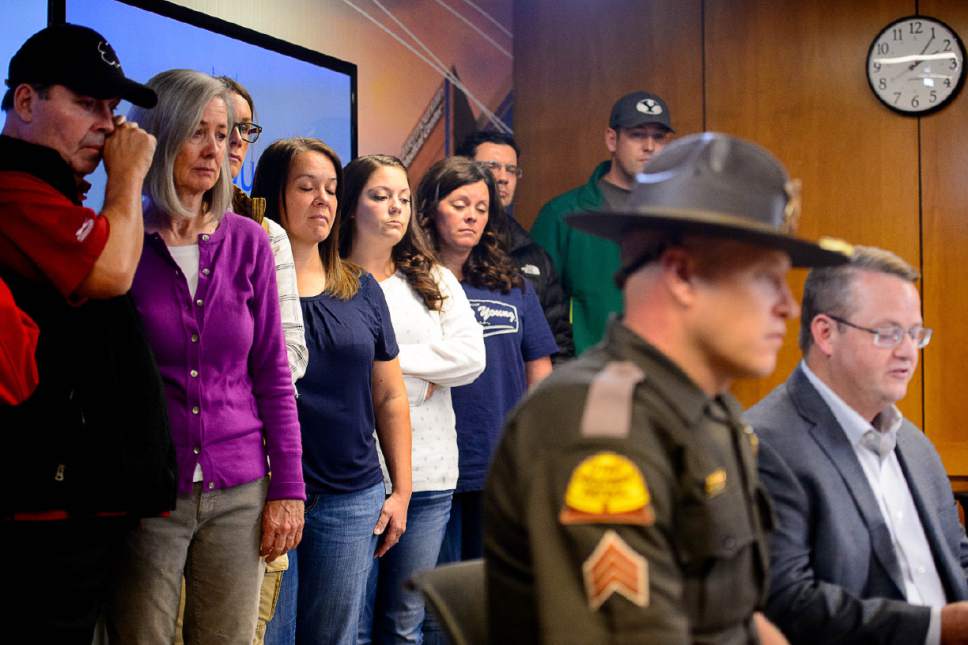 Trent Nelson  |  The Salt Lake Tribune
Backed by family members, Jason Moyes (far right), brother-in-law of Utah Highway Patrol Trooper Eric Ellsworth, makes a statement at Intermountain Medical Center in Murray, Tuesday November 22, 2016. Ellsworth was critically injured Friday when a car struck him while he was assisting at the scene of a Box Elder County emergency. At center right is Utah Highway Patrol Trooper Todd Royce.