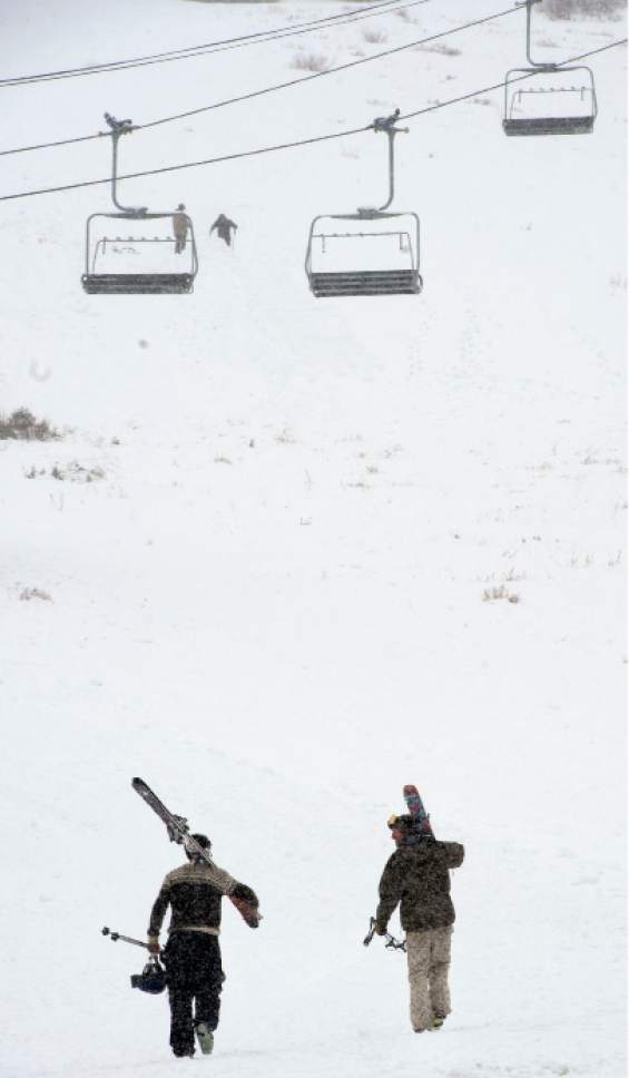 Steve Griffin / The Salt Lake Tribune


A snow start to falls as skiers hike back up the hill at Alta in Salt Lake City Monday November 21, 2016. Area ski resorts have not opened due to lack of snow.