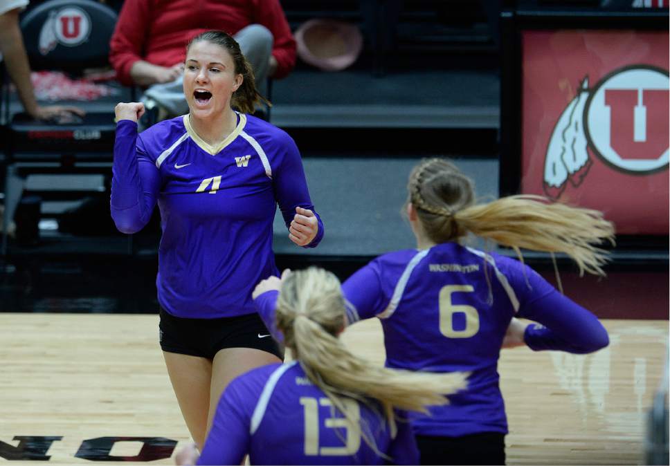 Scott Sommerdorf   |  The Salt Lake Tribune  
Washington's Courtney Schwan celebrates a point during the deciding fourth game as No. 8 Washington defeated Utah 3-1, Sunday November 19, 2016.