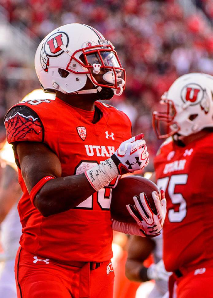 Trent Nelson  |  The Salt Lake Tribune
Utah Utes running back Joe Williams (28) celebrates a touchdown as Utah hosts Oregon, NCAA football at Rice-Eccles Stadium in Salt Lake City, Saturday November 19, 2016.