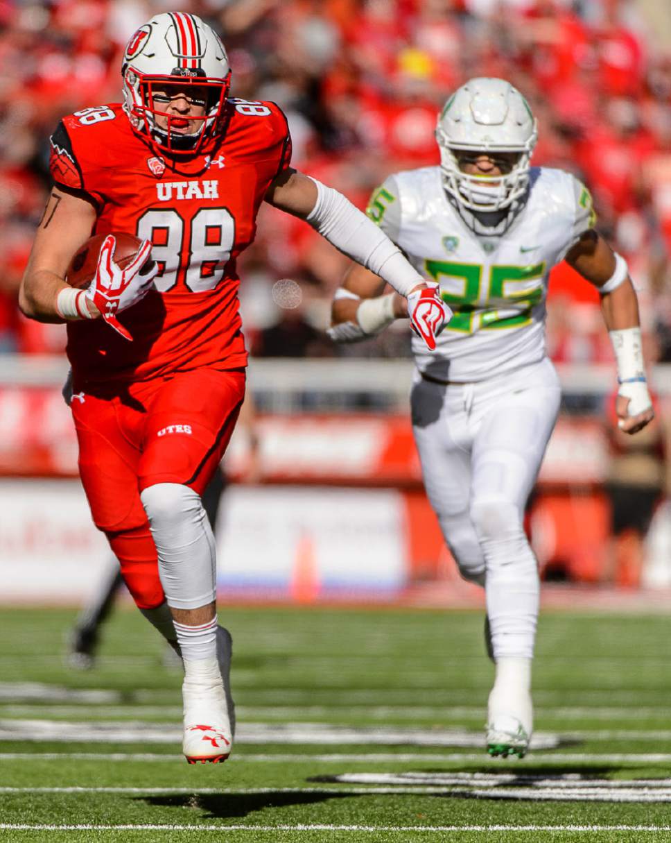 Trent Nelson  |  The Salt Lake Tribune
Utah Utes tight end Harrison Handley (88) runs the ball as Utah hosts Oregon, NCAA football at Rice-Eccles Stadium in Salt Lake City, Saturday November 19, 2016.