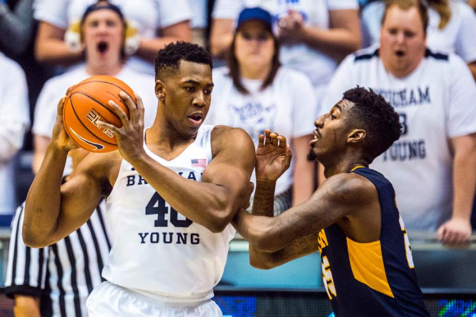 Chris Detrick  |  The Salt Lake Tribune
Brigham Young Cougars forward Jamal Aytes (40) and Coppin State Eagles forward Terry Harris Jr. (25) during the game at the Marriott Center Thursday November 17, 2016.