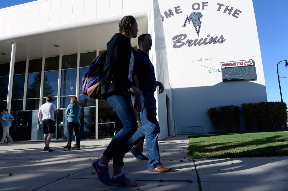 Al Hartmann  |  The Salt Lake Tribune
Relieved parents pick up their children at Mountain View High School in Orem Tueday Nov. 15.  A 16-year-old boy allegedly stabbed several other male students before turning his knife on himself .  The school was put on lockdown before parents could pick up their children.