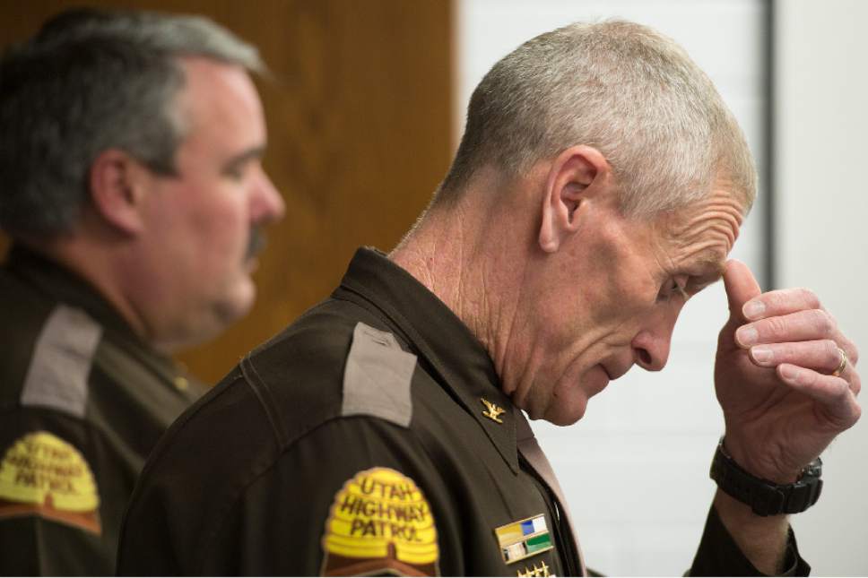 Leah Hogsten  |  The Salt Lake Tribune
l-r Utah Highway Patrol Lt. Lee Perry and Colonel Michael Rapich prepare to speak concerning the death of Trooper Eric Ellsworth, age 32, who succumbed to his injuries Tuesday, November 22, 2016. Ellsworth was struck by a car on Nov. 18 as he directed traffic at the scene of a downed power line in Box Elder County. Ellsworth had been with the department for seven years and lived in Brigham City with his wife and three young sons. Ellsworth is a second-generation UHP trooper -- his father, Ron Ellsworth, also worked for the department and is now retired.