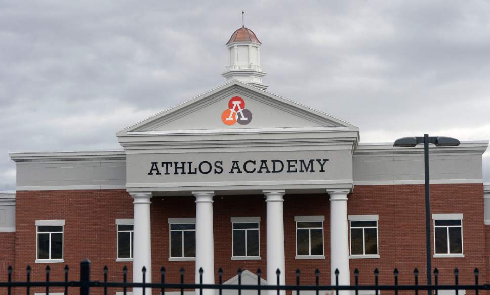 Al Hartmann  |  The Salt Lake Tribune
Utah Rep. Rich Cunningham is accusing Athlos Academy of Utah of violating Utah law, which requires public schools to open a bid process before sending taxpayer dollars to building costs. Athlos' private parent company built the school's Herriman location, which Athlos now leases.