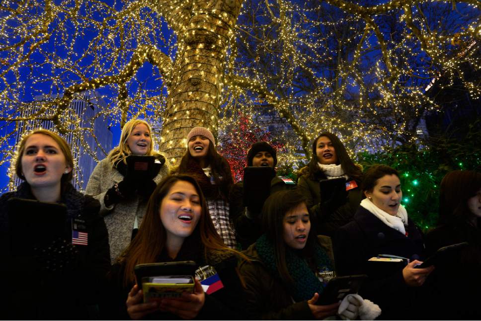 Scott Sommerdorf   |  The Salt Lake Tribune
LDS missionaries sing Christmas carols on Temple Square in Salt Lake City, Friday, Nov. 27, 2015. There will be more Christmas music on Saturday, Nov. 26 as local high school, college and community choral groups will perform 40-minutes sets from 3-9 p.m.