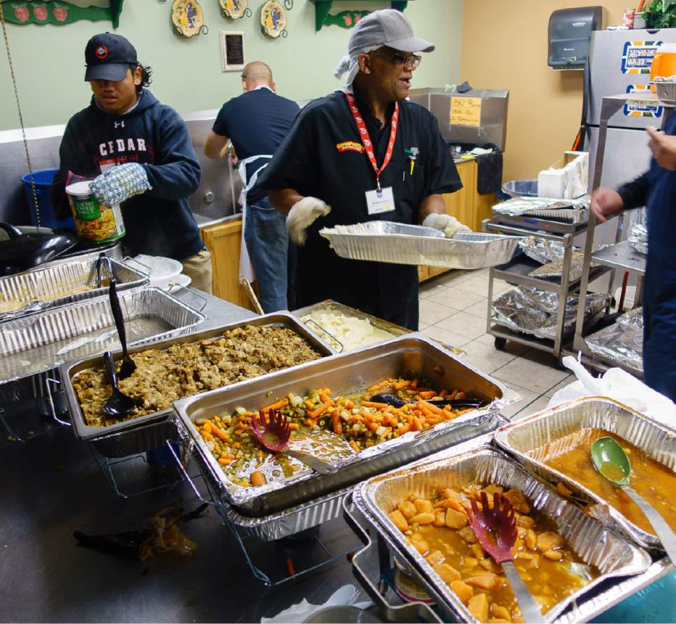 Trent Nelson  |  The Salt Lake Tribune
Emmett Myles working in the kitchen at the Salt Lake City Mission's Thanksgiving event for the homeless, in Salt Lake City, Thursday November 24, 2016.