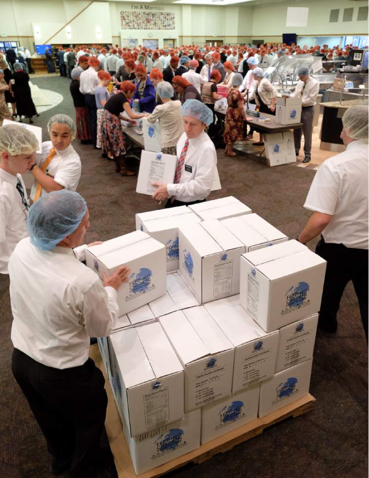 Francisco Kjolseth | The Salt Lake Tribune
Missionaries spend part of their day packaging 350,000 Thanksgiving meals for at-risk children at the Missionary Training Center in Provo on Thursday, Nov. 24, 2016.