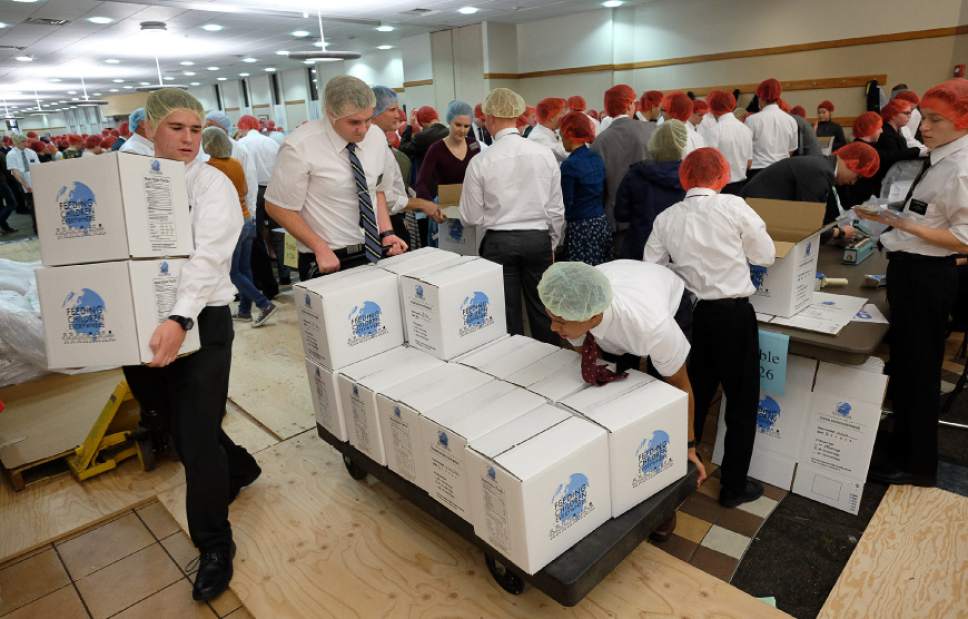 Francisco Kjolseth | The Salt Lake Tribune
Missionaries spend part of their day packaging 350,000 Thanksgiving meals for at-risk children at the Missionary Training Center in Provo on Thursday, Nov. 24, 2016. The Feeding Children Everywhere project sends the meals nationally and internationally as a food source for at-risk kids to take home for the weekend.
