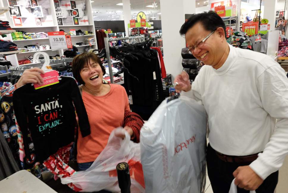 Francisco Kjolseth | The Salt Lake Tribune
Kim Lawson and her brother Paul Lee express their giddiness at scoring some deals while shopping at  JCPenney at Valley Fair Mall, which opened it's doors at 3pm on Thursday, Nov 24, 2016, and was remaining open non-stop until Friday at 10pm.