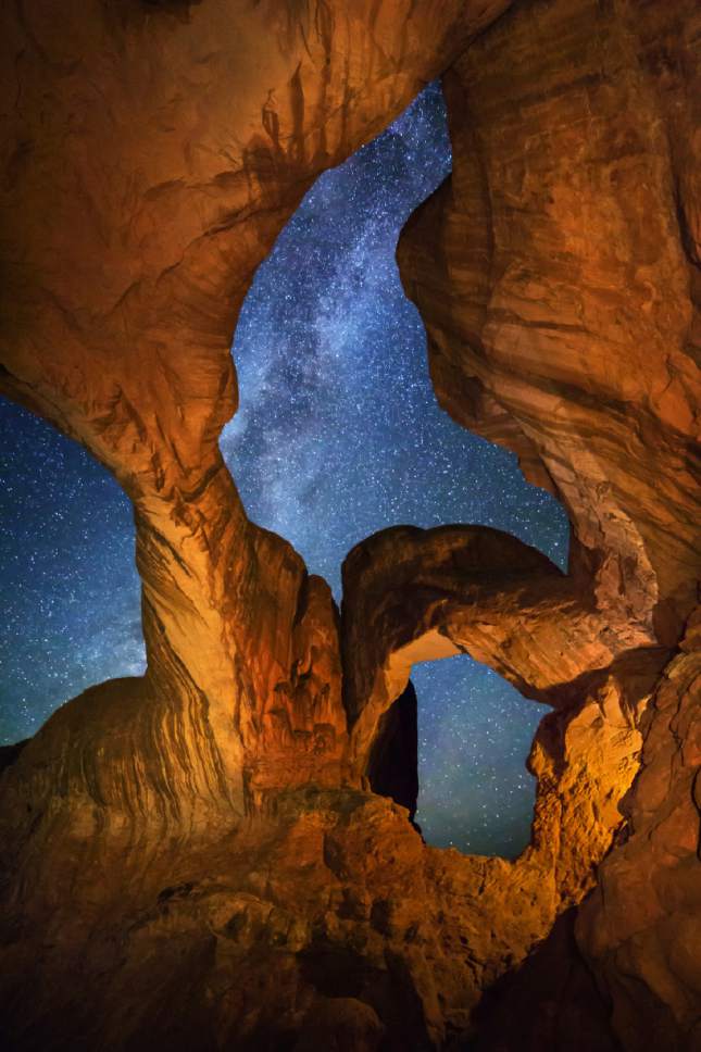 Courtesy  |  Royce Bair

The stars above Arches National Park are on full display in this photograph of Double Arch by Salt Lake City photographer Royce Bair. Specializing in NightScape photography, Bair frequently posts his and other photographers' landscape images on social media. Photo courtesy of Royce Bair.