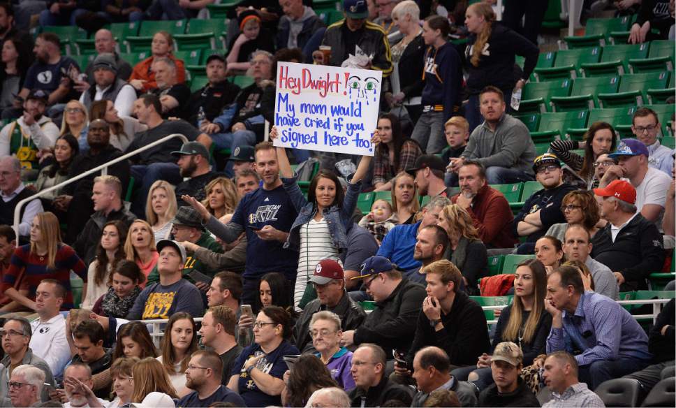 Scott Sommerdorf   |  The Salt Lake Tribune  
A Jazz fan has a message for Hawks center Dwight Howard. The Jazz held a 40-30 lead over the Atlanta Hawks during first half play, Friday November 25, 2016.