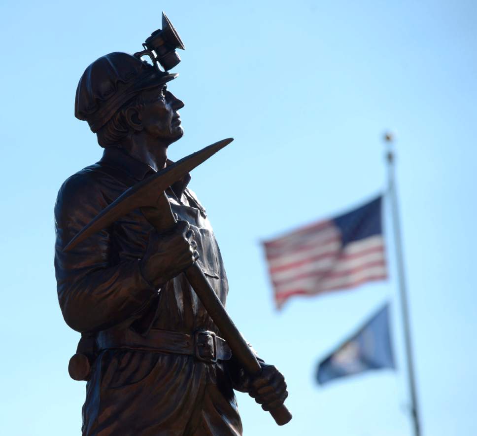 Tribune file photo by Al Hartmann  |  The Salt Lake Tribune
A large statue of a single miner with pick axe stands over the Carbon County Coal Miners' Memorial in Price, one of many sculptures that Helper artist Gary Prazen produced during his lifetime. He died earlier this month and will be honored Saturday at Carbon Country Club.