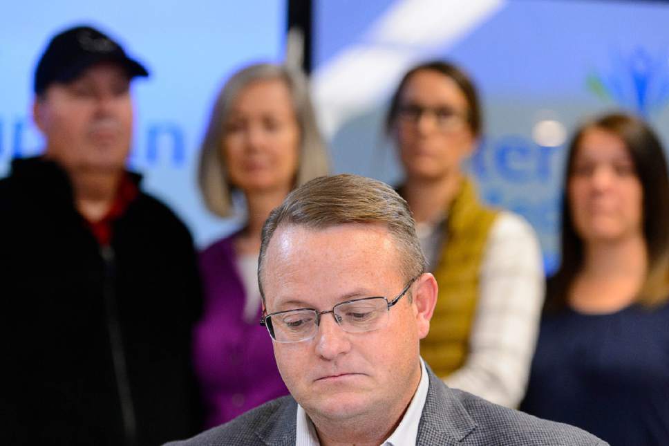 Trent Nelson  |  The Salt Lake Tribune
Backed by family members, Jason Moyes, brother-in-law of Utah Highway Patrol Trooper Eric Ellsworth, makes a statement at Intermountain Medical Center in Murray, Tuesday November 22, 2016. Ellsworth was critically injured Friday when a car struck him while he was assisting at the scene of a Box Elder County emergency.