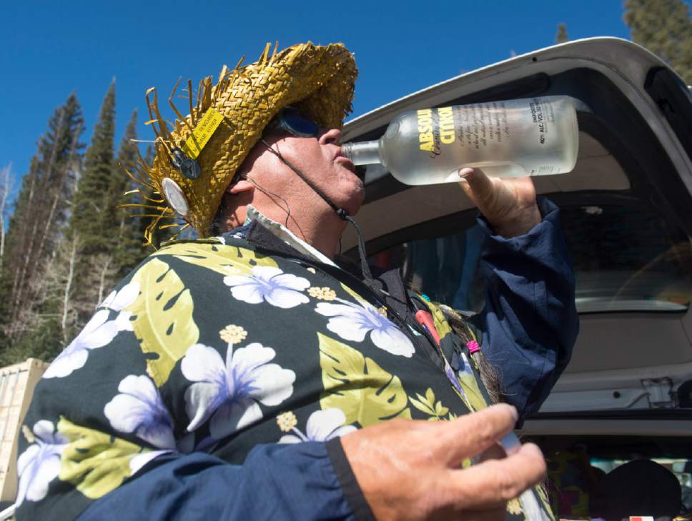 Rick Egan  |  The Salt Lake Tribune

Crazy George Pappas keeps his water in a vodka bottle, he loves the looks people give him as he gulps down the clear liquid. Wednesday, April 6, 2016.