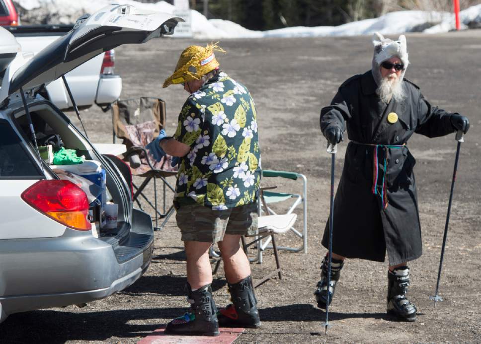 Rick Egan  |  The Salt Lake Tribune

Crazy George Pappas and his friend Rick, change into their warm clothes as the weather warms on a sunny spring afternoon, Wednesday, April 6, 2016.