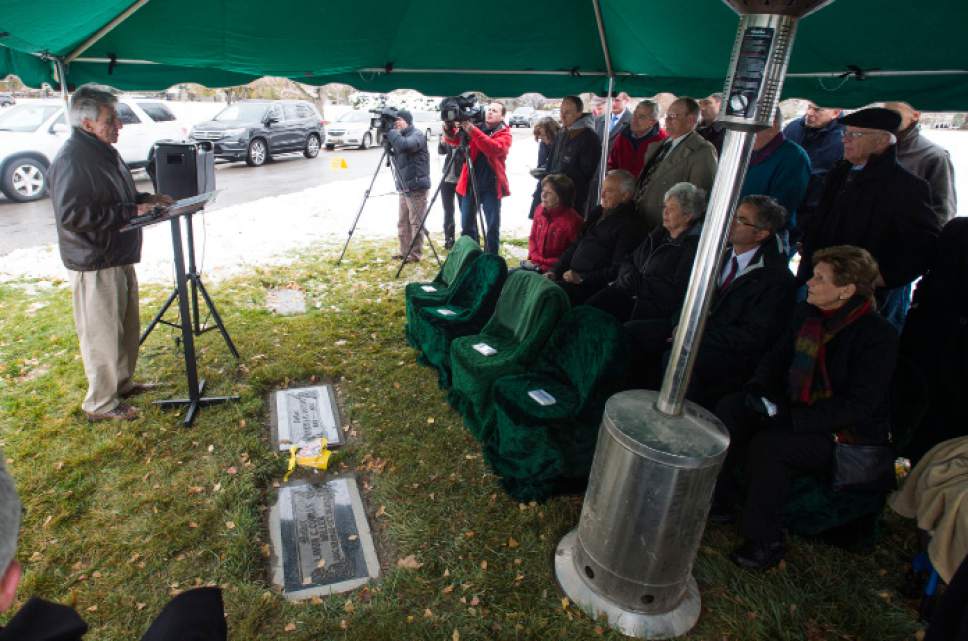 Steve Griffin / The Salt Lake Tribune


At the graveside of his parents, Lavon and Samuel Cowley, Sam Cowley tells about his father's life and eventual death as Special Agent for the FBI as the Utah Chapter of the Society of Former Special Agents of the FBI holds a memorial service for Cowley, who died Nov. 28, 1934, from wounds suffered in a gun battle with notorious bank robber Lester Gillis, known as Baby Face Nelson. Cowley was born in Idaho and received a degree from the Utah Agricultural College in Logan. Service was held at the Wasatch Lawn Memorial Park in Salt Lake City Monday November 28, 2016.