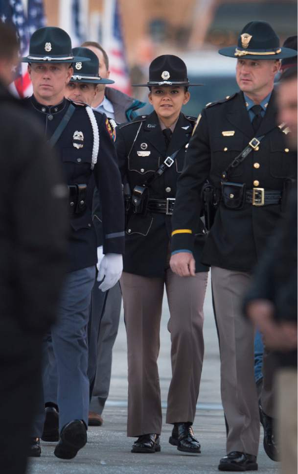 Leah Hogsten  |  The Salt Lake Tribune
Officers from Louisiana, West Virginia, North Carolina, New York, Wisconsin and Colorado arrived at the Willard LDS Stake Center to pay their respects to the family of Utah Highway Patrol Trooper Eric Ellsworth, who was hit by a car on the night of November 18, 2016 while trying to alert the driver of a semitrailer truck to go around a downed power line in Box Elder County. Ellsworth died four days later.