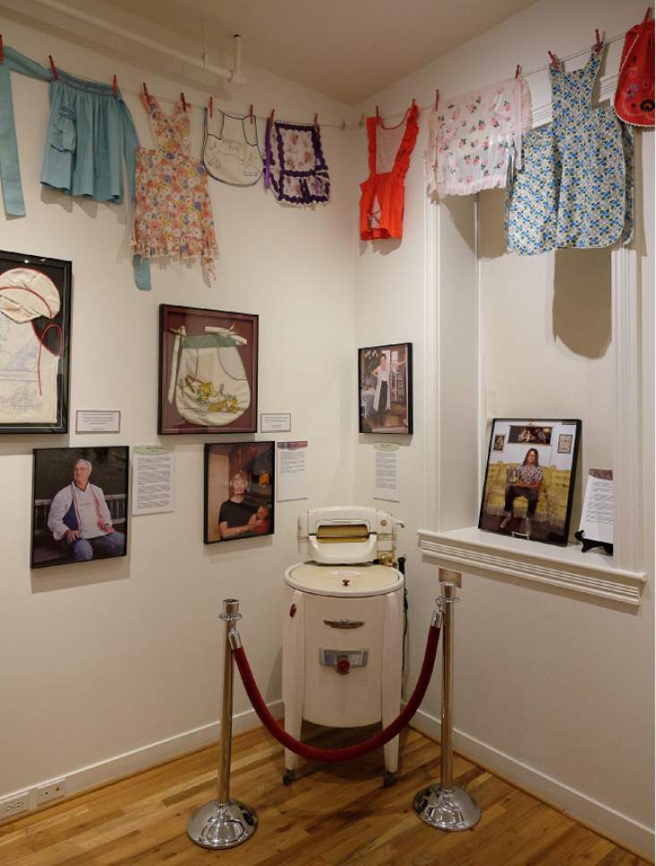 Francisco Kjolseth | The Salt Lake Tribune
The Park City Museum hosts the "Apron Chronicles: A Patchwork of American Recollections." The exhibit features 100 vintage aprons as well as stories/memories behind this domestic icon. The storytellers include a 111-year-old mother and her only child, a Holocaust survivor and a biology professor from Africa.