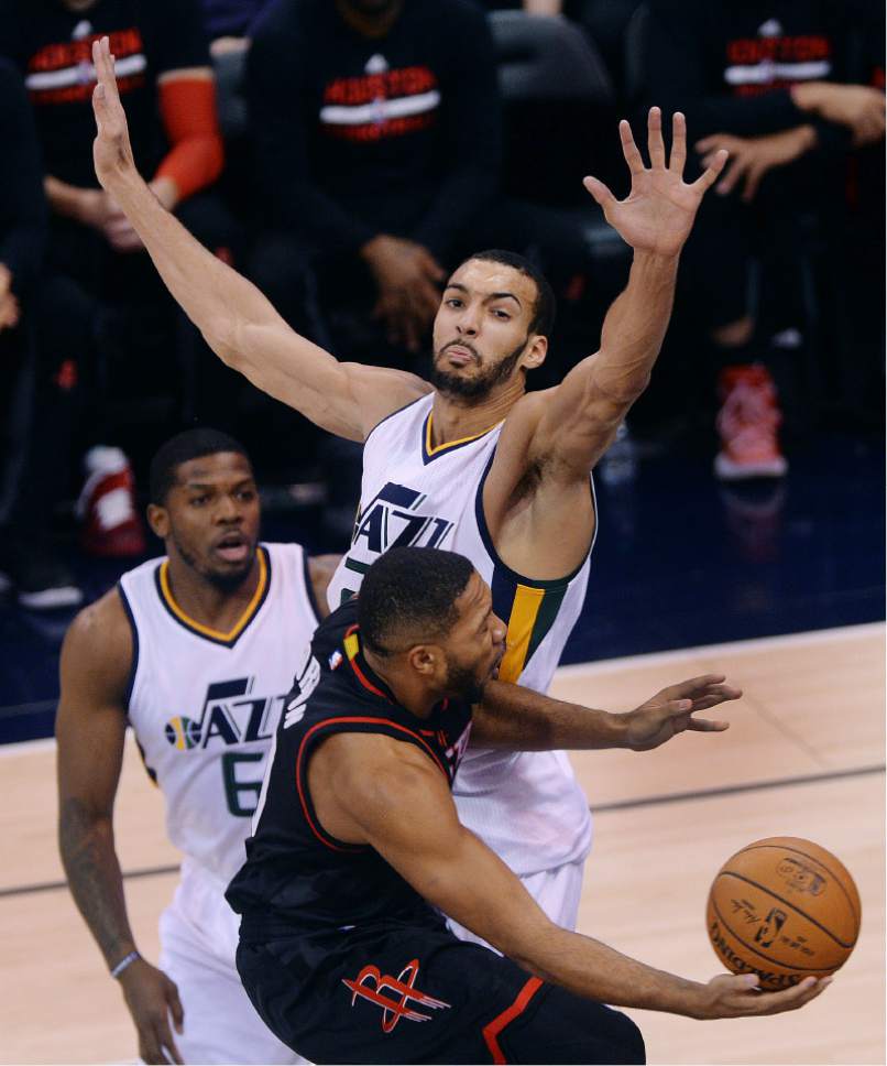 Steve Griffin / The Salt Lake Tribune


Utah Jazz center Rudy Gobert (27) stretches out his arms as he guards the lane stopping Houston Rockets guard Eric Gordon (10) during the Utah Jazz versus Houston Rockets NBA game at Vivint Smarthome Arena in Salt Lake City Tuesday November 29, 2016.