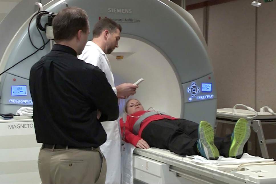 Jeffrey Anderson and an MRI technician observes as Auriel Brunsvik Peterson enters the MRI.

Courtesy photo