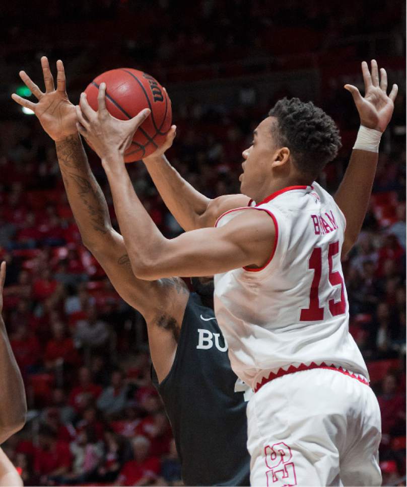 Michael Mangum  |  Special to the Tribune

Utah Utes senior guard Lorenzo Bonam (15) is pressured to the baseline by Butler Bulldogs junior forward Tyler Wideman (4) during their game at the Huntsman Center in Salt Lake City on Monday, November 28th, 2016. Bonam finished the game with 17 points and the Utes fell to the Bulldogs 68-59.