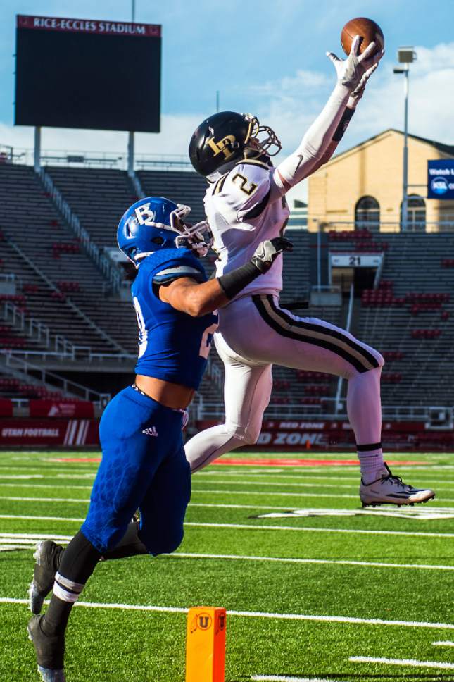 Chris Detrick  |  The Salt Lake Tribune
Lone Peak's Tyler Macpherson (2) can't make a catch while being covered by Bingham's Daniel Loua (20) during the 5A football championship at Rice-Eccles Stadium Friday November 18, 2016.