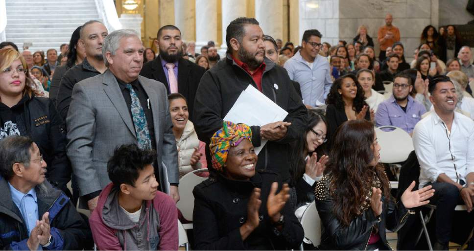 Al Hartmann  |  The Salt Lake Tribune
101 people from 43 countries take part in a Naturalization Ceremony Wednesday, November 30 at the Utah State Capitol.  They stand for applause as their former country is named.  This group was from Mexico. They later took the Oath of Allegiance to make them new American citizens.