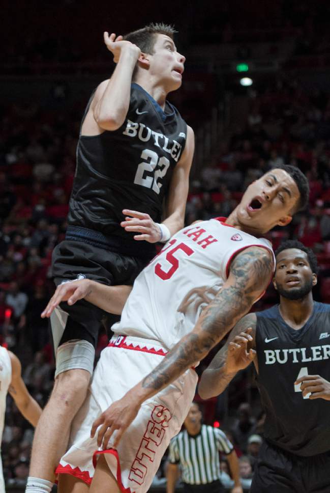 Michael Mangum  |  Special to the Tribune

Utah Utes junior forward Kyle Kuzma (35) takes a charge from Butler Bulldogs freshman forward Sean McDermott (22) during their game at the Huntsman Center in Salt Lake City on Monday, November 28th, 2016.