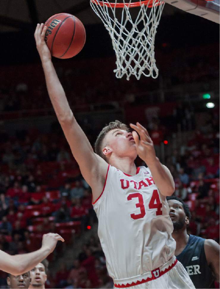 Michael Mangum  |  Special to the Tribune

Utah Utes freshman center Jayce Johnson (34) lays the ball in during their game against the Butler Bulldogs at the Huntsman Center in Salt Lake City on Monday, November 28th, 2016.