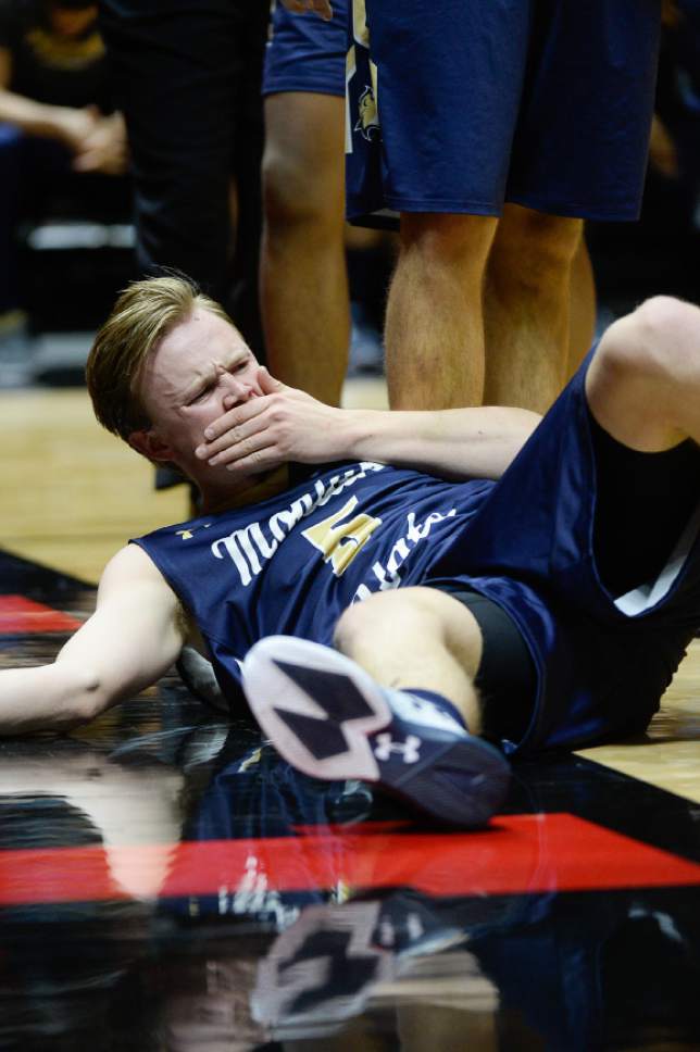 Francisco Kjolseth | The Salt Lake Tribune
Montana State Bobcats guard Harald Frey (5) gets hit on the mouth as he fouls out as Utah hosts Montana State, NCAA basketball at the Huntsman Center in Salt Lake City on Thursday, Dec. 1, 2016.