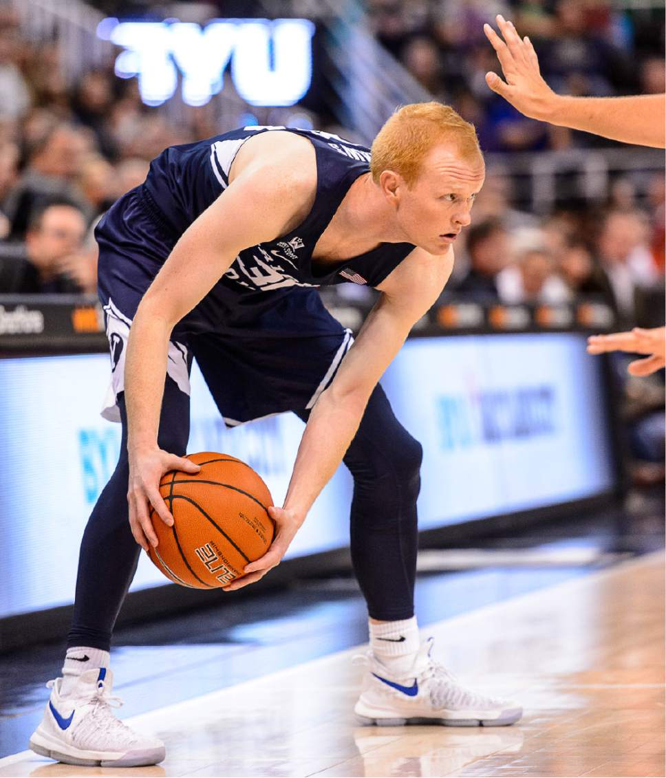 Trent Nelson  |  The Salt Lake Tribune
Brigham Young Cougars guard TJ Haws (30) holds the ball as BYU faces Utah State, NCAA basketball in Salt Lake City, Wednesday November 30, 2016.