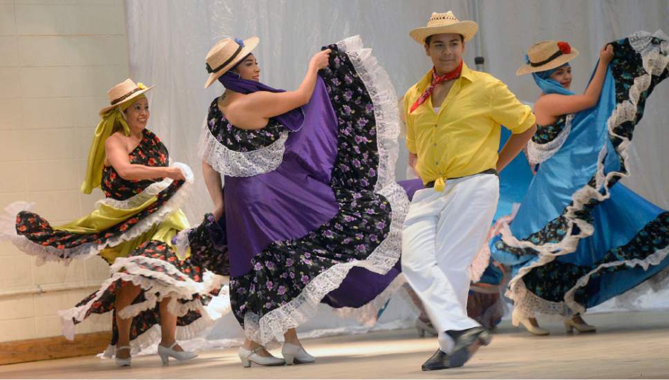 Al Hartmann  |  The Salt Lake Tribune
Members of the Ballet Folklorico de las Americas perform at event for the renovation of the  Centro Civico Mexicano at 155 South 600 West in Salt Lake City Tuesday Nov. 29.  The new Centro Civico Mexicano will include a cultural center and the development of affordable senior housing units.
With the support Salt Lake City, Utah DEQ, and recent contributions of the U.S. Environmental Protection Agency and Salt Lake County, the ongoing environmental cleanup and redevelopment project will revitalize CCM and enhance the services they provide to Utah's growing Latino community. CCM is using grant funding from EPA and Salt Lake County to begin key cleanup activities related to the project this winter.