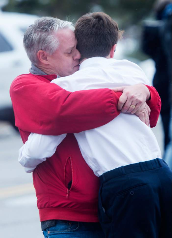 Rick Egan  |  The Salt Lake Tribune

David Fowers hugs his son Dan, a 9th grader, that was in the science class when the shooting occurred, at Mueller Park Jr High, in Bountiful, Thursday, December 1, 2016.