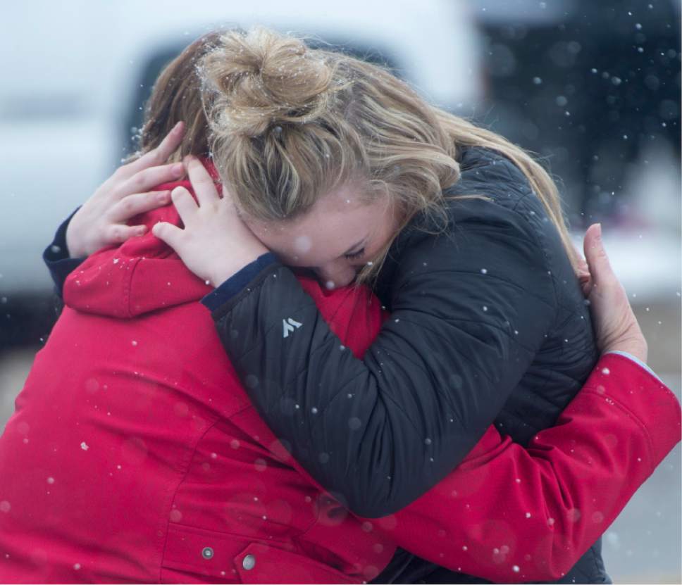 Rick Egan  |  The Salt Lake Tribune

DeAnne Bailey hugs her daughter Hannah Bailey as they wait for informant about De Anne's other daughter Halissa, at Mueller Park Jr High, after a reported shooting this morning, Thursday, December 1, 2016.