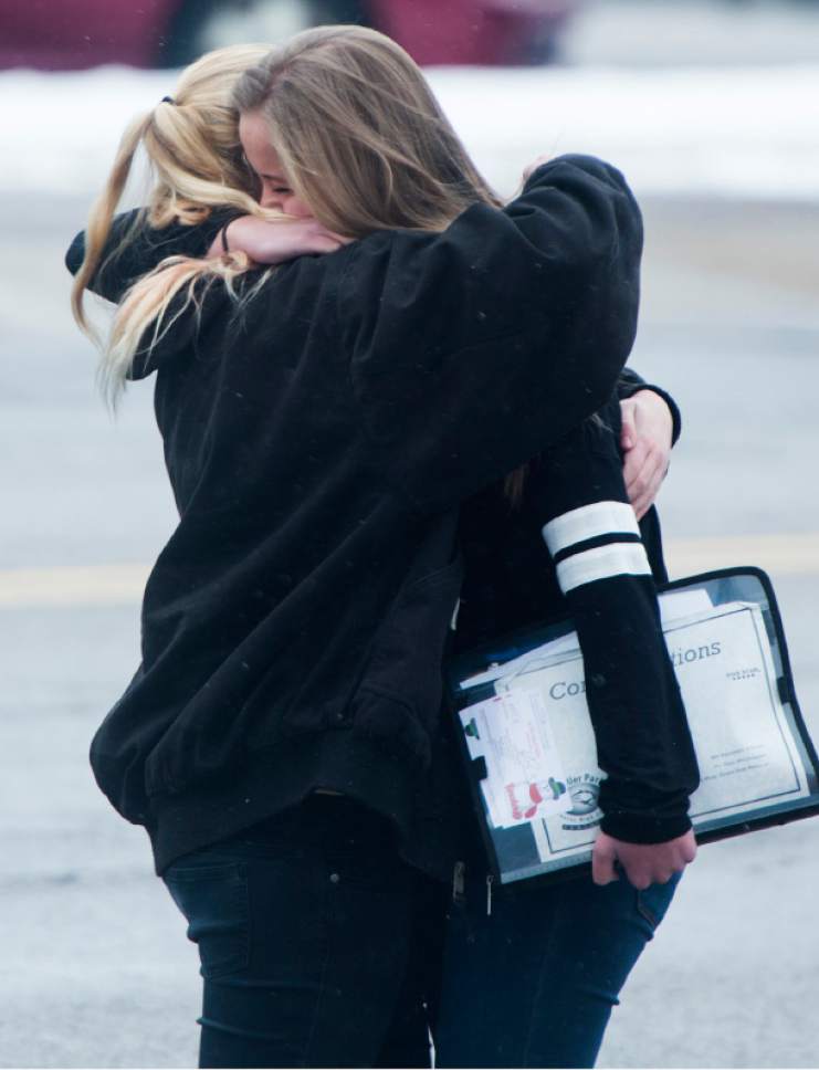 Rick Egan  |  The Salt Lake Tribune

Katie Christensen, hugs Seneca Zaugg, both students are in 9th grade at Mueller Park Jr. High, in Bountiful, where there was a shooting, Thursday, December 1, 2016.