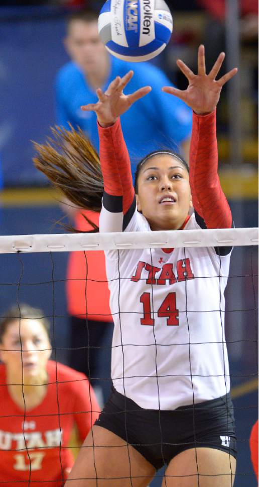 Leah Hogsten  |  The Salt Lake Tribune
Utah outside hitter Adora Anae (14) gets the block. University of Utah women's volleyball team were defeated by UNLV during the first round of the NCAA tournament Friday, December 2, 2016 on the campus of Brigham Young University.