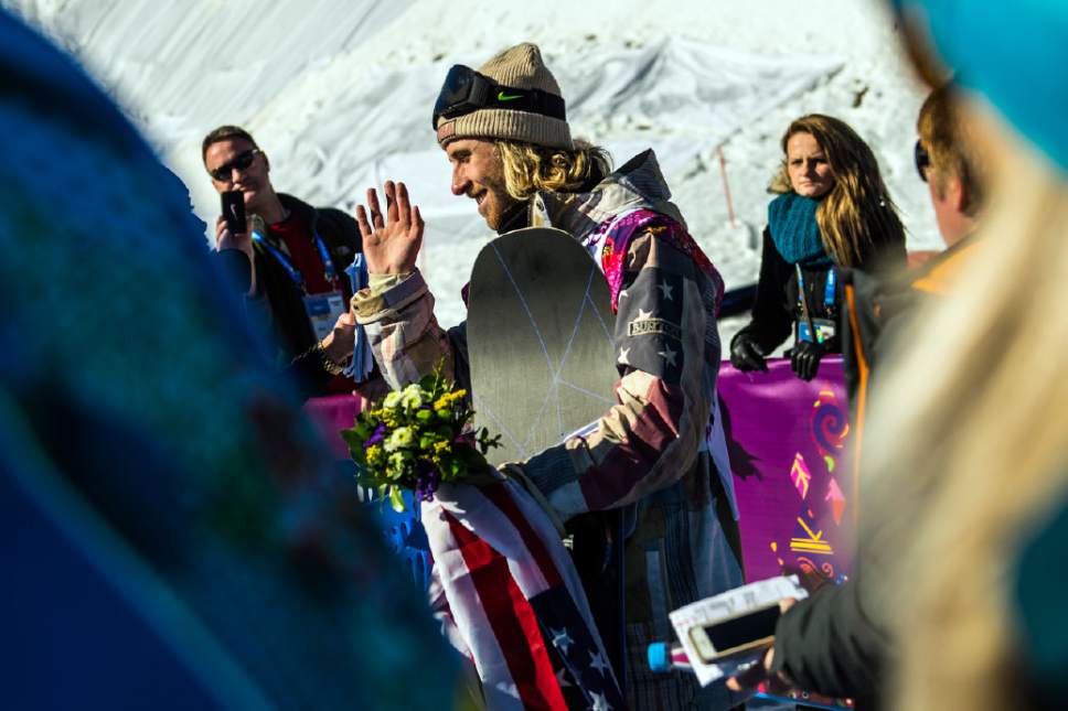 KRASNODAR KRAI, RUSSIA  - JANUARY 8:
Sage Kotsenburg, of Park City, waves at fans after winning in the Men's Slopestyle Finals at the Rosa Khutor Extreme Park during the 2014 Sochi Olympic Games Saturday February 8, 2014. Kotsenburg won the gold medal with a score of 93.50. 
(Photo by Chris Detrick/The Salt Lake Tribune)