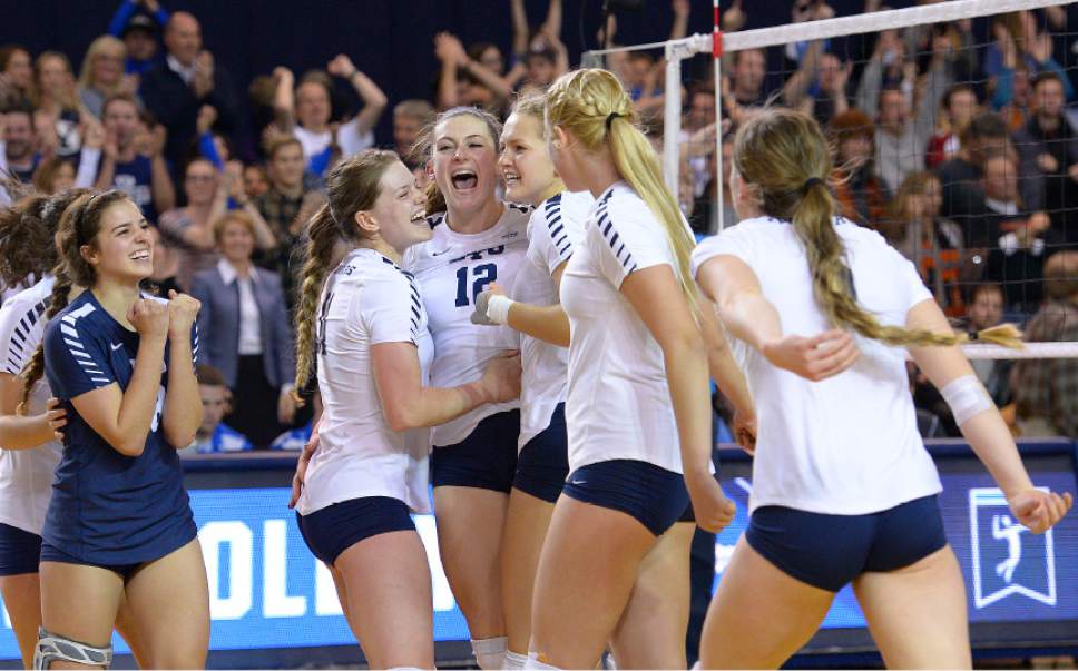 Leah Hogsten  |  The Salt Lake Tribune
BYU celebrates the win. Brigham Young University women's volleyball team defeated Princton 3-0 during the first round of the NCAA tournament Friday, December 2, 2016 on the campus of Brigham Young University.