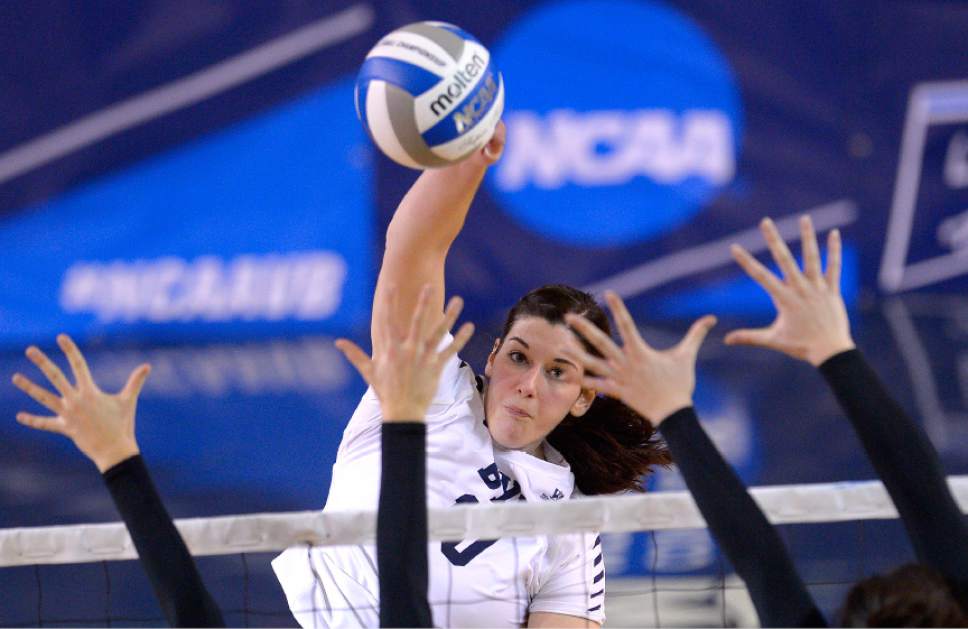Leah Hogsten  |  The Salt Lake Tribune
BYU middle blocker Amy Boswell (10) slams the ball over the net. Brigham Young University women's volleyball team defeated Princton 3-0 during the first round of the NCAA tournament Friday, December 2, 2016 on the campus of Brigham Young University.