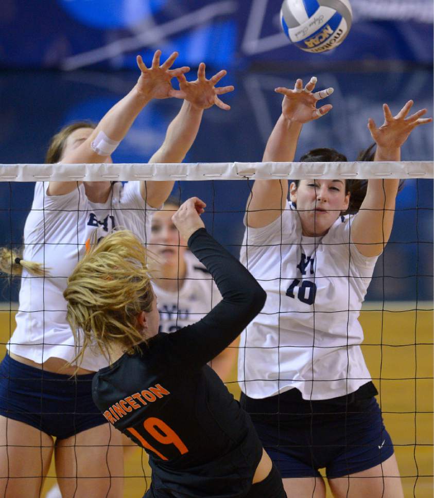 Leah Hogsten  |  The Salt Lake Tribune
BYU outside hitter Hannah Robison (20) and BYU middle blocker Amy Boswell (10) try to make the stop. Brigham Young University women's volleyball team defeated Princton 3-0 during the first round of the NCAA tournament Friday, December 2, 2016 on the campus of Brigham Young University.